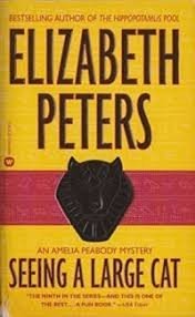 читать Увидеть огромную кошку